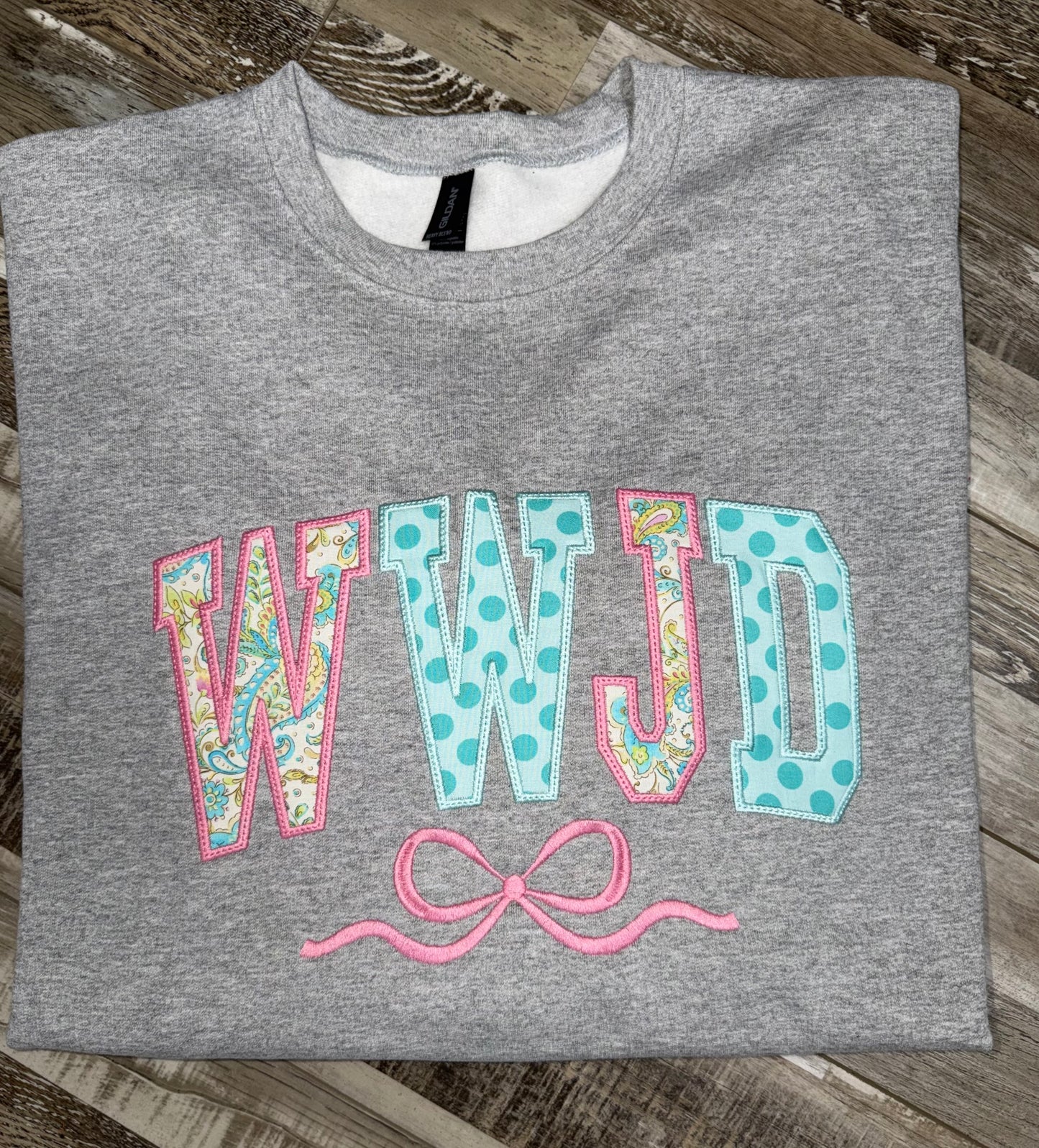 WWJD Bow Crewneck