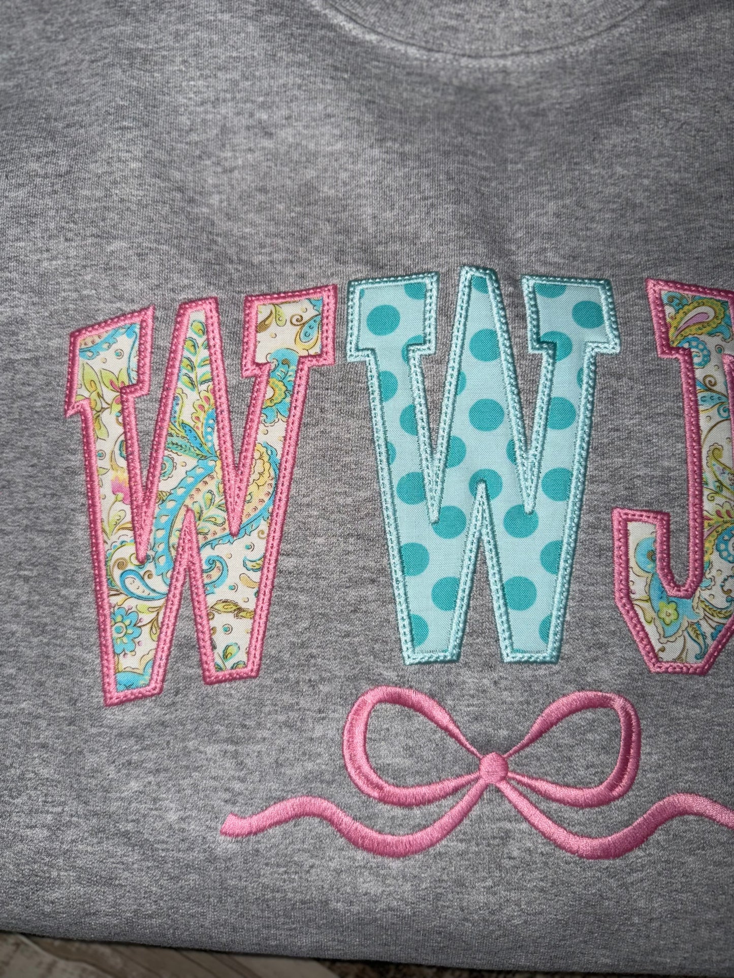 WWJD Bow Crewneck